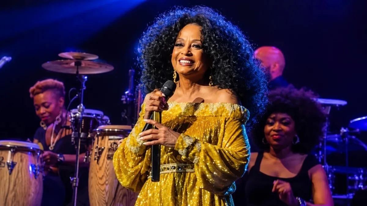 Diana Ross smiling during a live performance, featured in an article about Diana Ross Net Worth, her personal life, family, lifestyle, and enduring entertainment career.