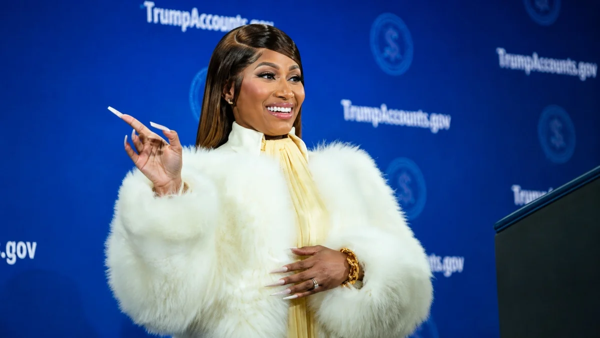 Nicki Minaj at a formal event in a white fur coat for Nicki Minaj Net Worth article