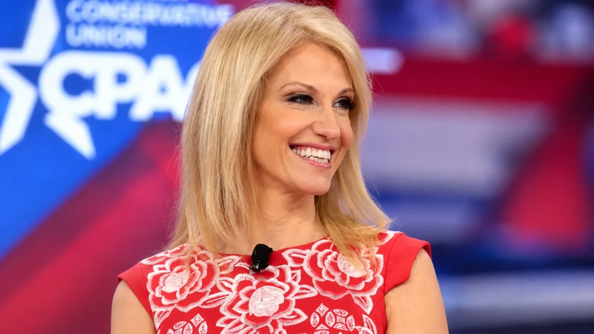 Kellyanne Conway smiling at a public event for Kellyanne Conway Net Worth coverage.
